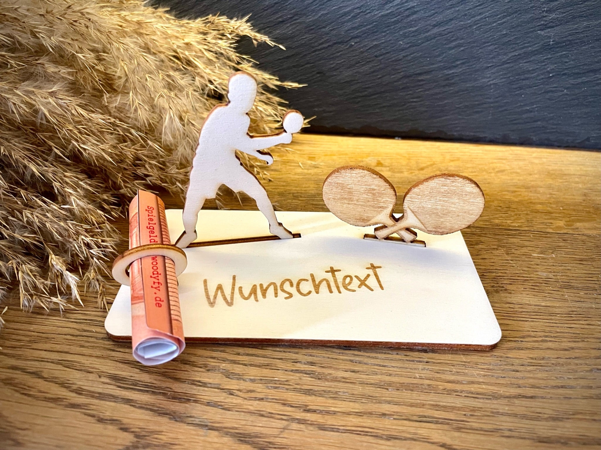 Geldscheinhalter Tischtennisspieler mit Tischtennisschläger