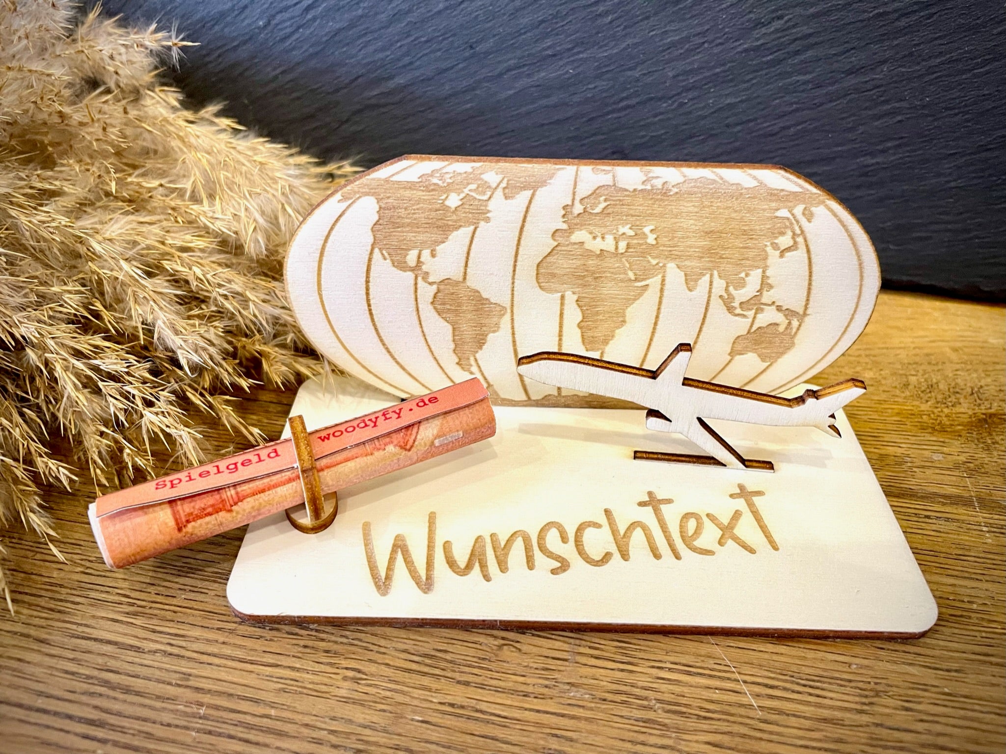 Geldscheinhalter Urlaub, Weltkarte mit Flieger