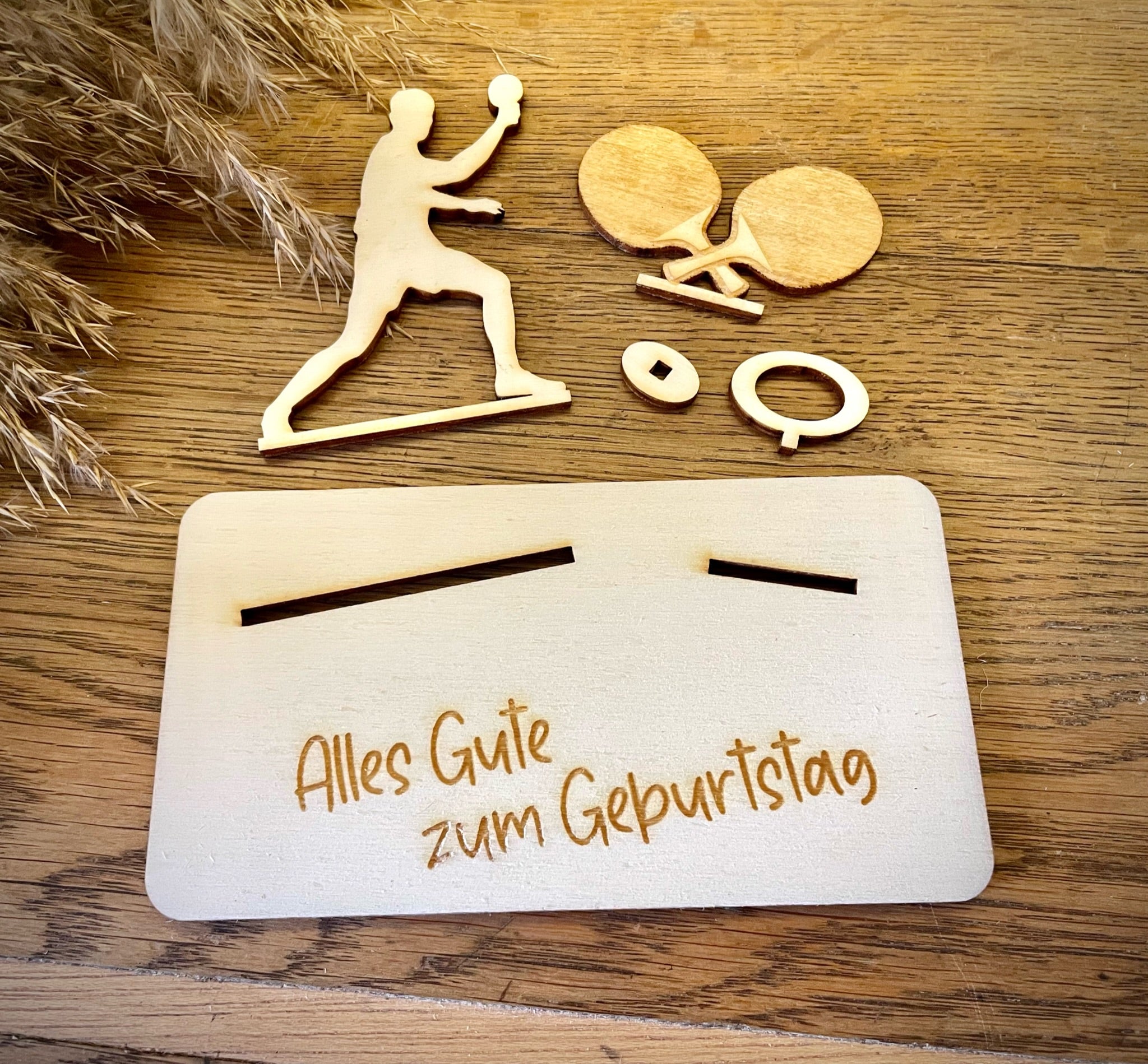 Geldscheinhalter Tischtennisspieler mit Tischtennisschläger